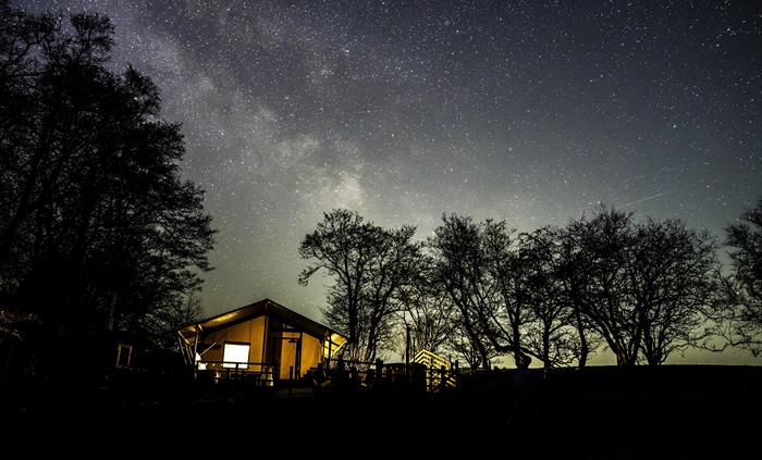 The Milky Way over Stellar Safari Lodge with clear dark skies.